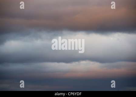 Cloudscape Blue and Pink Orange Cumulus Clouds of  Mid Winter Sunset, Sheffield, UK, Background Stock Photo