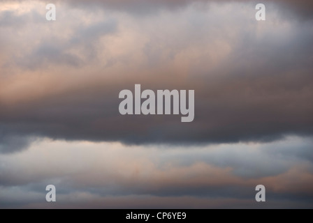 Cloudscape Blue and Pink Orange Cumulus Clouds of  Mid Winter Sunset, Sheffield, UK, Background Stock Photo