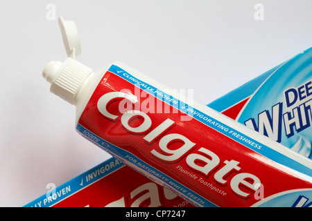 tube of Colgate deep whitening fluoride toothpaste with lid up set against white background - colgate toothpastes Stock Photo