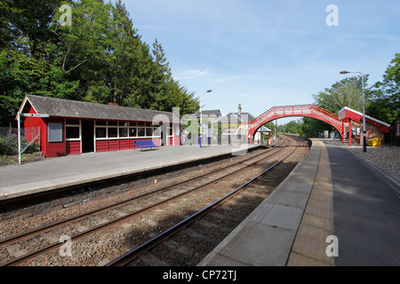 Foot bridge over the railway tracks looking east at Wetheral Station in Cumbria, UK Stock Photo