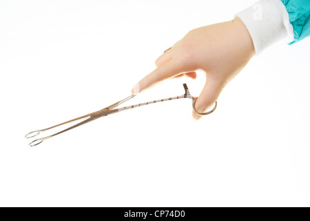 Surgical instrument  (Foerster (Ballenger) Sponge Forceps)  held by surgeons hand isolated on white background Stock Photo