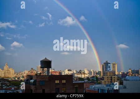 A double rainbow, as seen from the roof of a building in West Village, New York City, NY, USA. Oct. 27, 2010. Stock Photo