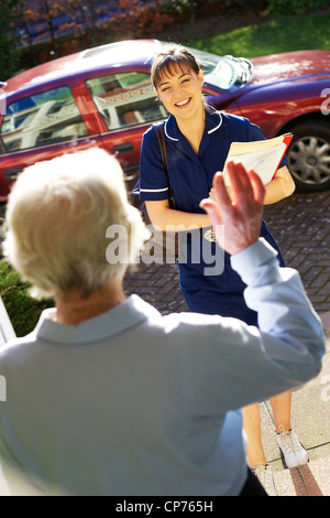 District Nurse on home visit Stock Photo