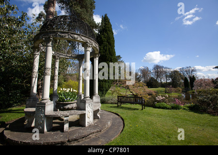 Cholmondeley Castle Gardens. Picturesque spring view of an arbour with the Temple Garden in the background. Stock Photo