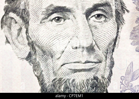 Macro of Abe Lincoln on the US five dollar bill. Stock Photo