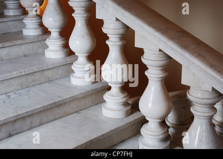 ancient marmoreal stairs with balusters in daylight Stock Photo