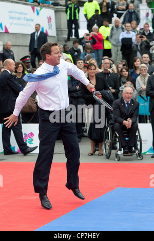 Prime Minister David Cameron plays tennis at International Paralympic Day 2011, Trafalgar Square Stock Photo