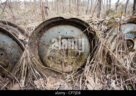 old car rim wheels on ground Stock Photo