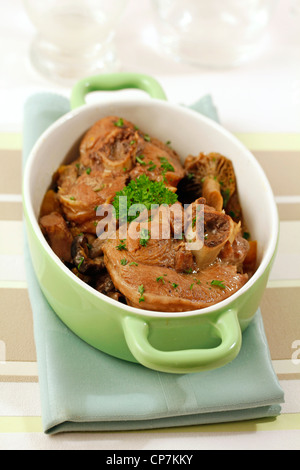 Turkey ossobuco with mushrooms. Recipe available. Stock Photo