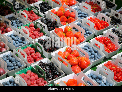 blueberries, blackberries, strawberries, raspberries, red and black currants on market in Provence, France Stock Photo