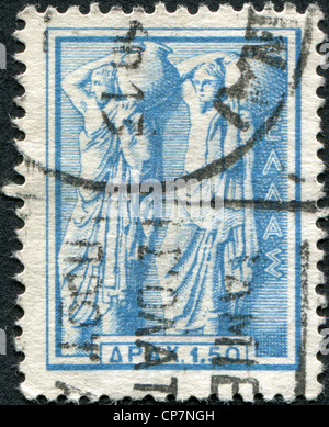 GREECE - CIRCA 1958: Postage stamps printed in Greece, dedicated to the Greek ancient art, shows a Pitcher bearers, circa 1958 Stock Photo