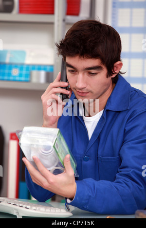 Young doing inventory Stock Photo