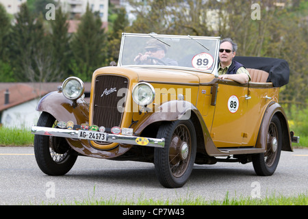 Vintage pre war race car Austin Tourer from 1936 at Grand Prix in Mutschellen, SUI on April 29, 2012. Stock Photo