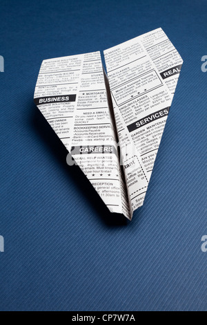 Newspaper Airplane, Classified Ad, business concept. Stock Photo