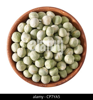 wooden bowl full of green peas isolated on white background Stock Photo