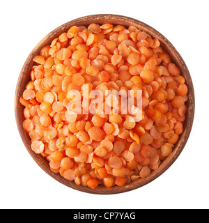 wooden bowl full of red split lentils isolated on white background