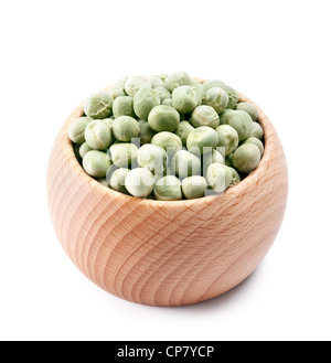 wooden bowl full of green peas isolated on white background Stock Photo