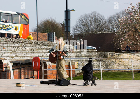 Busker on the streets in Stratford Upon Avon England on the River Avon Stock Photo