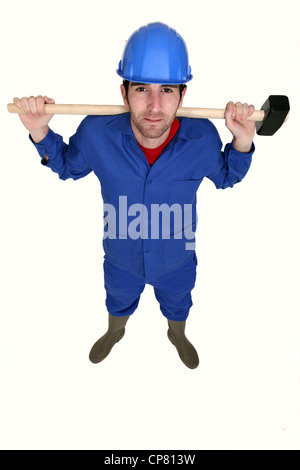 Tradesman holding a mallet Stock Photo