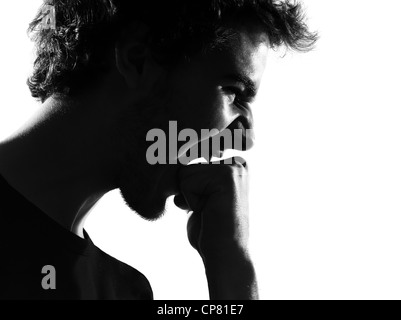 young man silhouette in studio isolated on white background Stock Photo