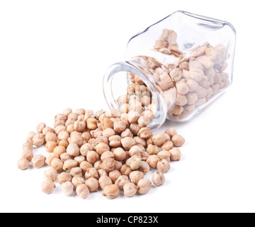 chickpeas scattered on a white background from glass jar Stock Photo