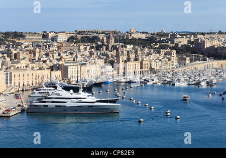 Luxury yachts moored within the Grand Harbour Valletta Malta Southern Europe Stock Photo