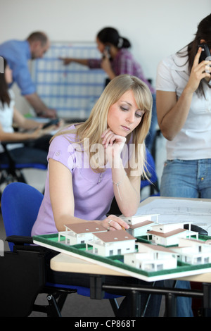 an architect working on scale models Stock Photo