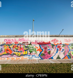 Grafiti covered section of Berlin Wall, back side of East Side Gallery, Berlin, Germany Stock Photo