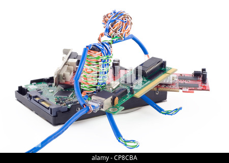 Twisted man assembled the computer from components and connects the Internet. Isolated on white. With clipping patch. Stock Photo