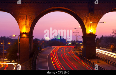 England, Cheshire, Stockport, view of M60 motorway, Viaduct and The Pyramid at twilight Stock Photo