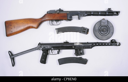 WW11 Russian  machine guns. PPsH 1941 with drum and box magazines and PPS43 machine gun with box magazine. Stock Photo