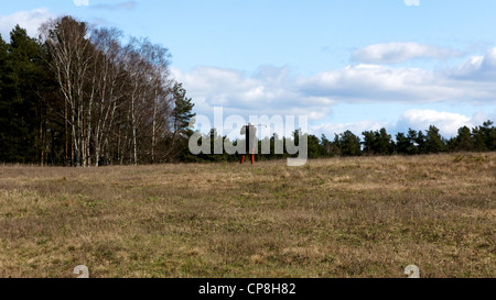 Landscape near Berlin, Germany, with a man playing cross-country golf in the center. Stock Photo