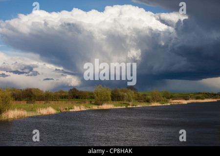 Storm clouds over Dorney Wetlands nature reserve in Dorney, Buckinghamshire, UK Stock Photo