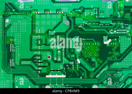 Printed circuit green electronic board background. Mass production Stock Photo