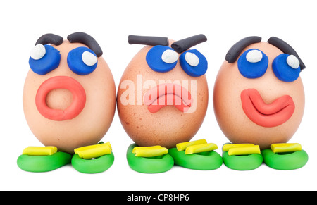 Comic humor cheerful emotional Easter eggs isolated on white Stock Photo