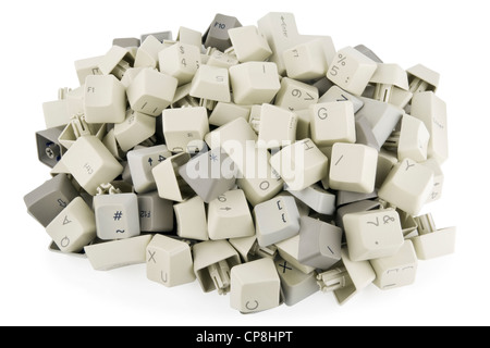 Heap of keys and buttons from standard keyboards. Isolated on white with patch Stock Photo