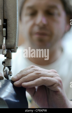 shoemaker working Stock Photo