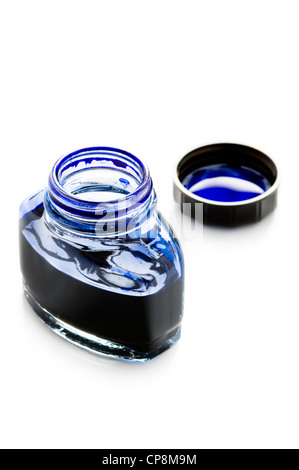 an open bottle of blue writing ink isolated on a white background Stock Photo