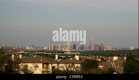 A view over low-rise buildings towards the Austin, Texas skyline. Stock Photo