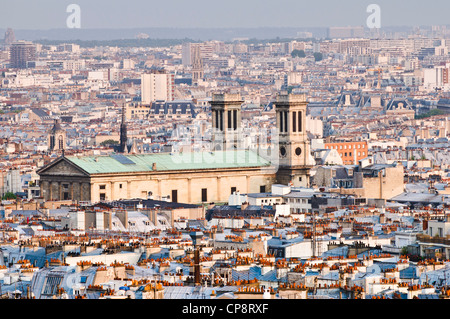 Church of Saint-Vincent-de-Paul and surrounding rooftops over Paris, France Stock Photo