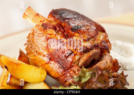 roasted pork knuckle with potatoes Stock Photo