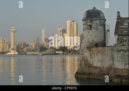 Old walls in area known as Manga plus skyscrapers in background in Bocagrande. Cartagena, Columbia Stock Photo