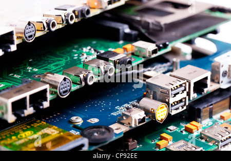 Different plugs on laptop mother boards Stock Photo