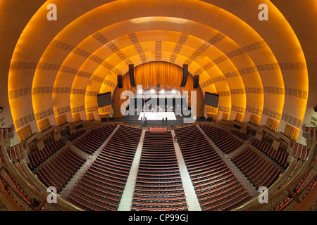 The view of the stage from the balcony as workers prepare for a show in historic Radio City Music Hall in New York City. Stock Photo