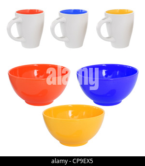 Three multicolored mugs and bowls, isolated on white Stock Photo