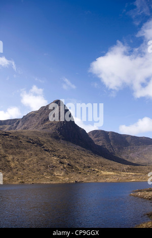 Looking across Loch Coire nan Arr reservoir  towards A'Chioch. Stock Photo