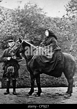 Queen Victoria with John Brown, QUEEN VICTORIA (1819-1901) with her manservant John Brown at Balmoral in 1863 by Scottish photographer George Wilson Stock Photo