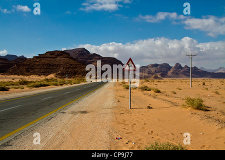 Beware of camels crossing, Wadi Rum, Jordan Stock Photo