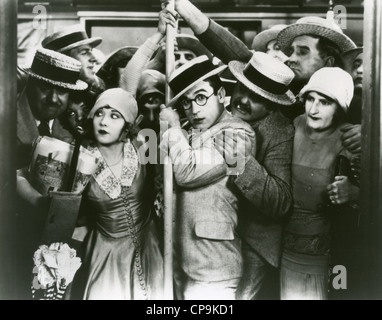 SPEEDY  1928 Paramount  silent film with Harold Lloyd in glasses next to Ann Christy Stock Photo