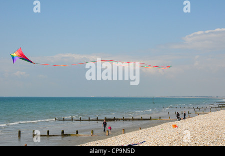 Kite flying above Bracklesham Bay Beach. Stock Photo